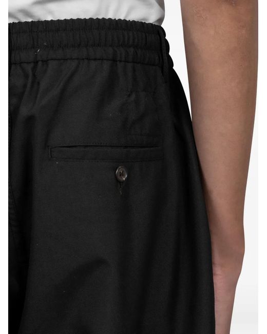 Universal Works Black Pleated Trousers for men
