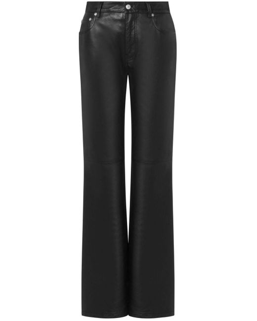 Pantalon en cuir à coupe évasée Moschino Jeans en coloris Black