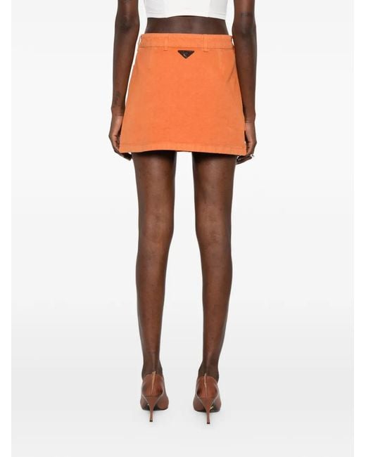 Minifalda con bolsillo en el frente Prada de color Orange