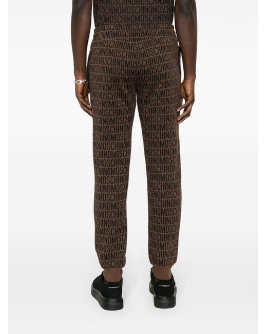 Pantalon de jogging à logo en jacquard Moschino pour homme en coloris Brown