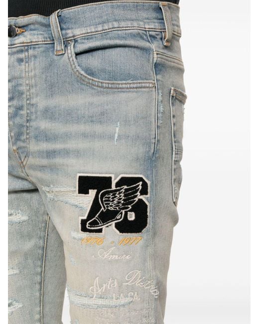 Jeans skinny con logo di Amiri in Gray da Uomo