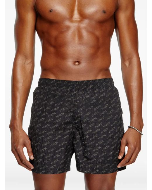 DIESEL Black Mid-Length Swim Shorts With All-Over Logo for men