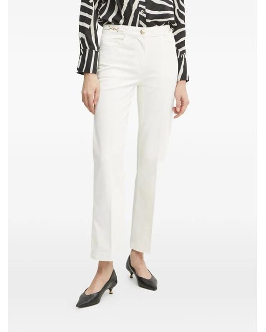 Marciano White Embellished-logo pocket jeans