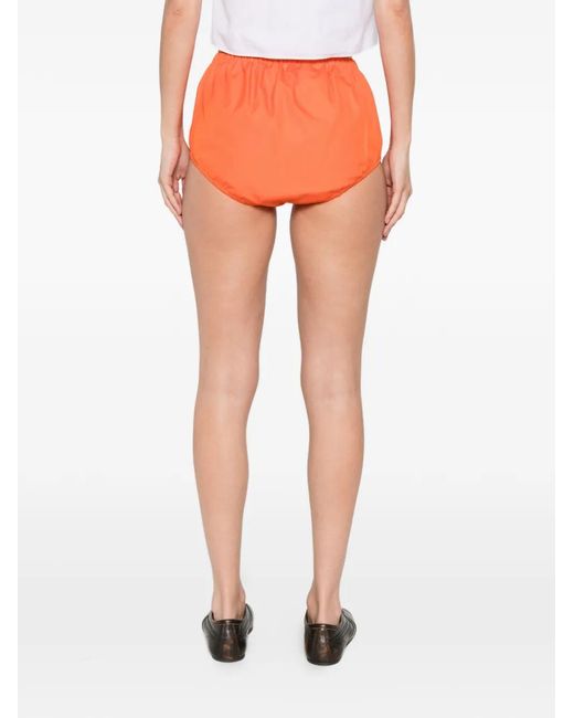 Prada Orange Button Flap Pocket Shorts
