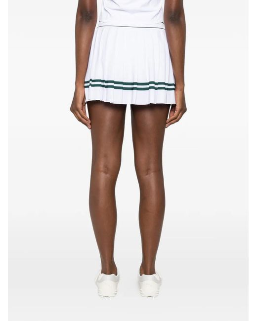 Sporty & Rich White Serif Logo Pleated Mini Skorts