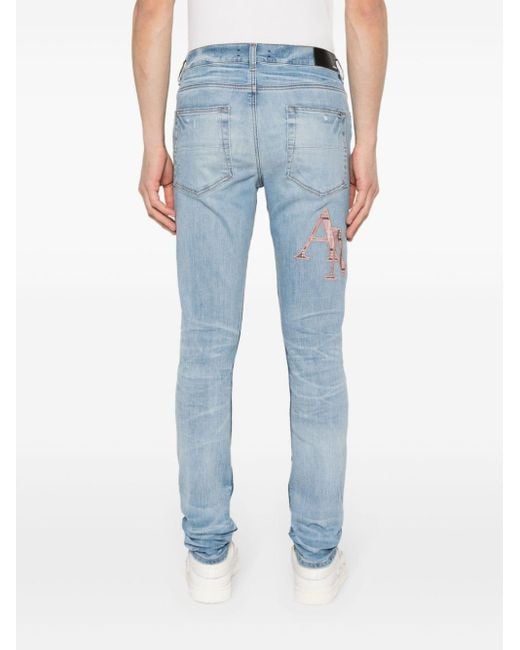 Amiri Skinny-Jeans mit Logo-Stickerei in Blue für Herren