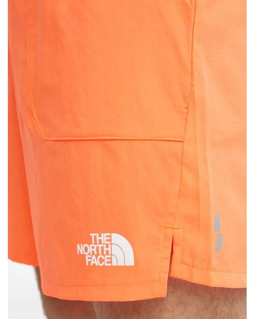 The North Face Orange Logo-Print Tack Shorts for men