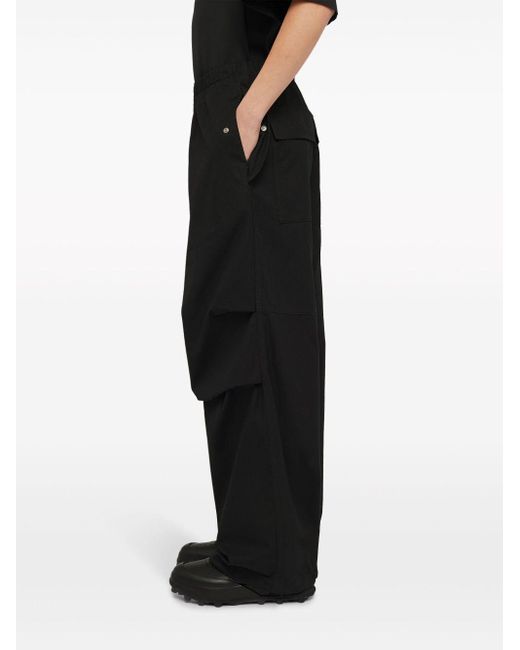Pantalon plissé à coupe ample Jil Sander pour homme en coloris Black