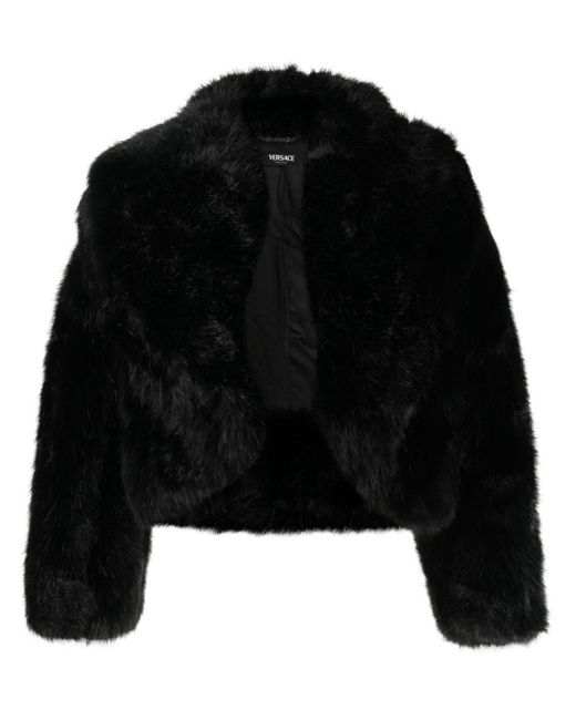 Giacca in finta pelliccia con cappuccio di Versace in Black