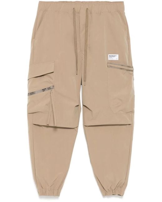 Musium Div. Natural Logo-Patch Trousers for men