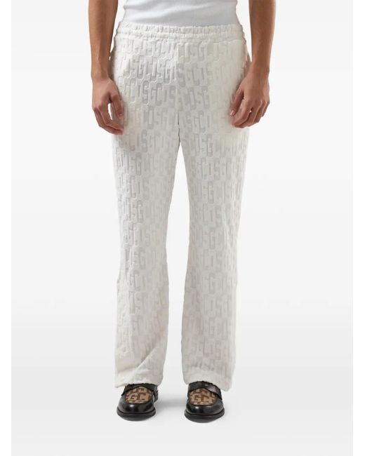Gcds White Monogram-Pattern Trousers for men