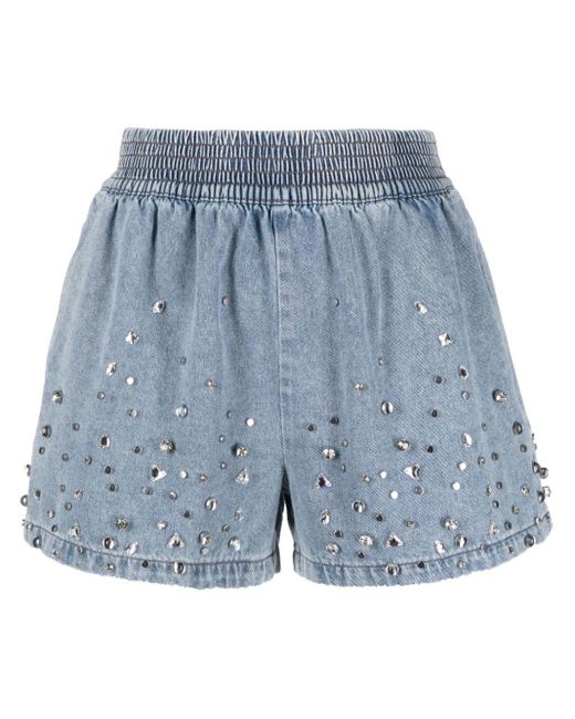 Short en jean à ornements en cristal Sandro en coloris Blue