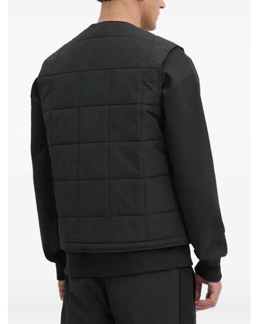Chaleco acolchado con parche y logo HUGO de hombre de color Black