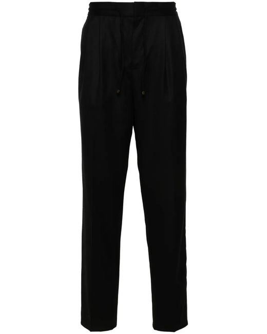 Brunello Cucinelli Black Pleat-Detail Tapered Trousers for men