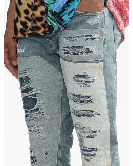 Amiri Blue Logo-Print Distressed Jeans for men