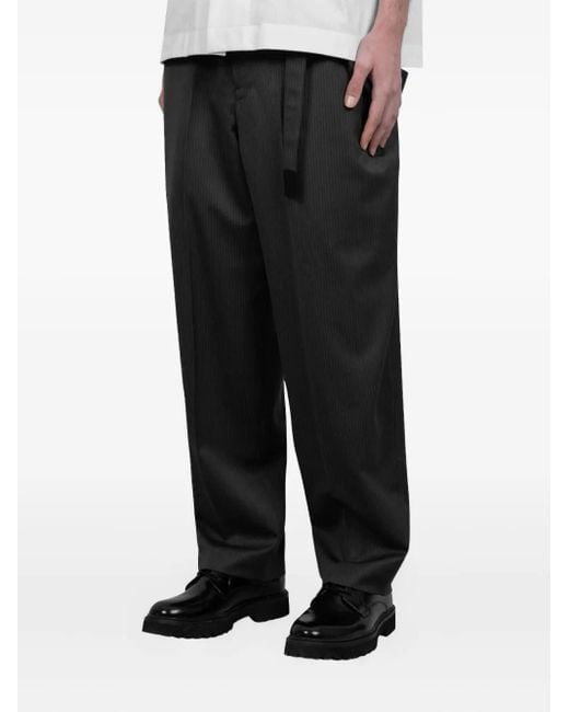 Sacai Black Pinstripe Wool Trousers for men