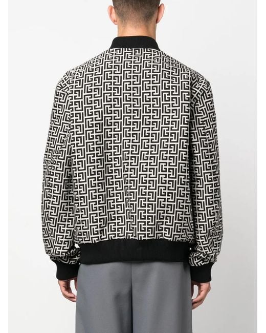 Balmain Black Reversible Monogram Bomber Jacket for men