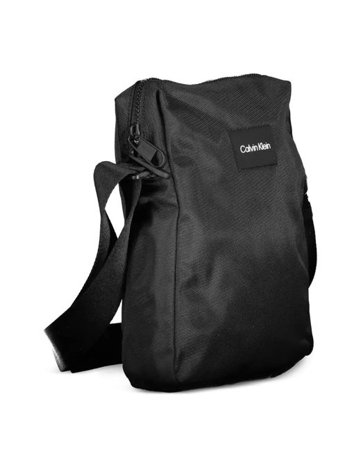 Calvin Klein Black Logo-Patch Messenger Bag for men