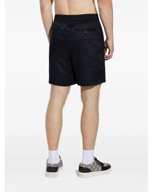 Emporio Armani Blue Monogram-Pattern Shorts for men