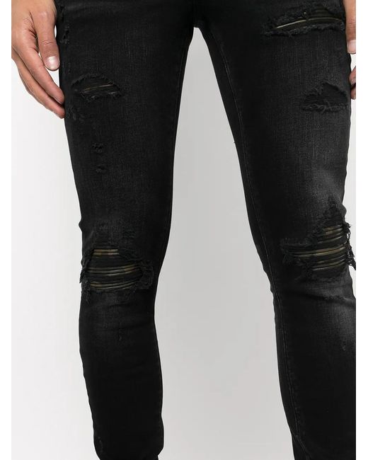 Amiri Black Distressed Skinny Jeans for men
