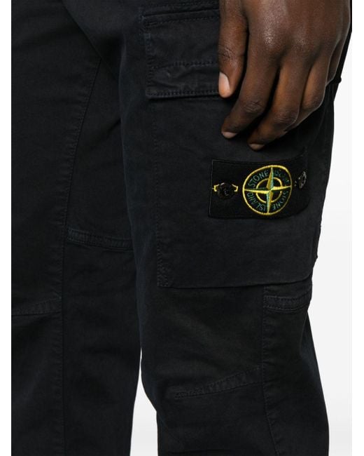 Pantaloni dritti con applicazione Compass di Stone Island in Black da Uomo
