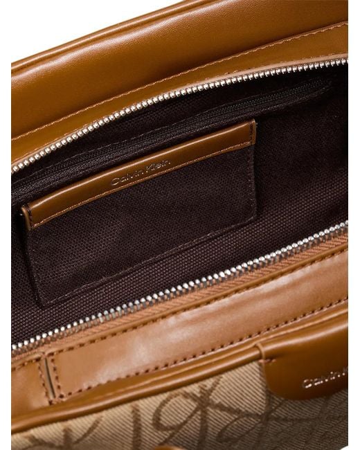Calvin Klein Metallic Emblem Monogram-Pattern Tote Bag