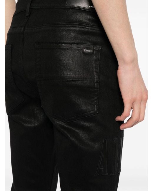 Amiri Schmale Distressed-Jeans mit Logo-Stickerei in Black für Herren