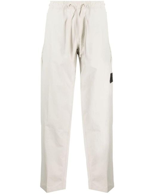 Pantalones Technical con aplique del logo Calvin Klein de hombre de color White