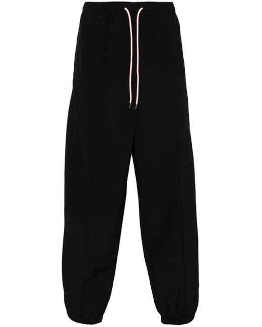 Pantalon de jogging à motif Cross Marcelo Burlon pour homme en coloris Black