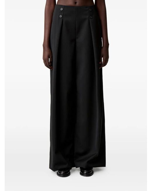 Pantalones con detalle de botones Claudie Pierlot de color Black