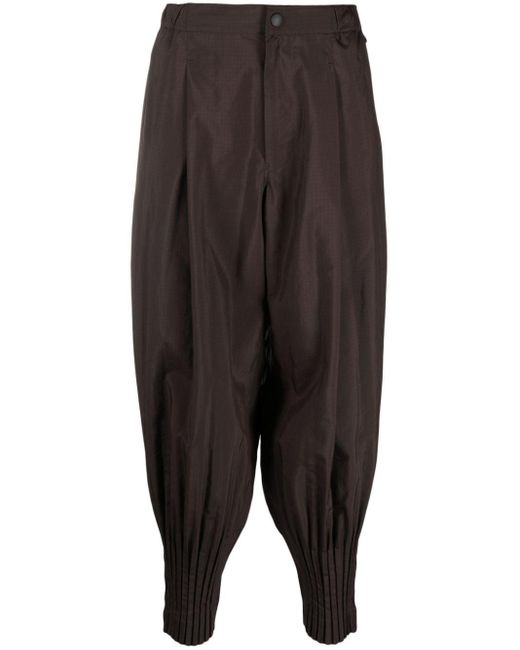 Pantaloni Cascade affusolati plissé di Homme Plissé Issey Miyake in Black da Uomo
