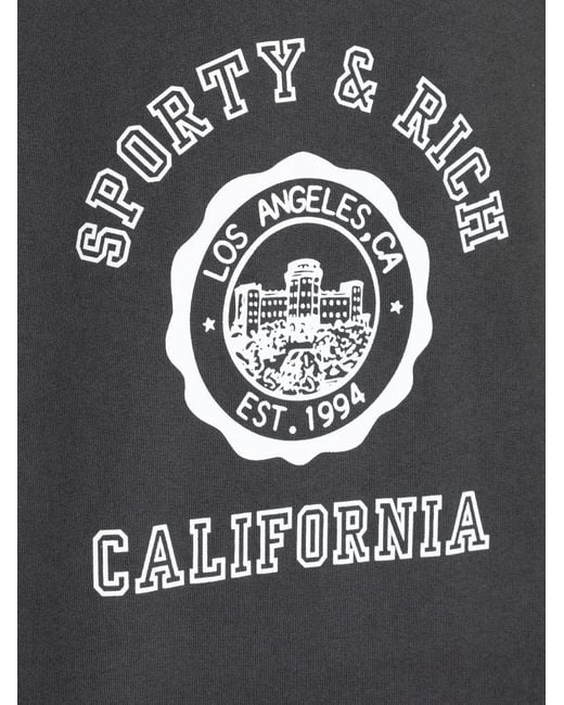 Sporty & Rich Black Graphic Crew Neck Top