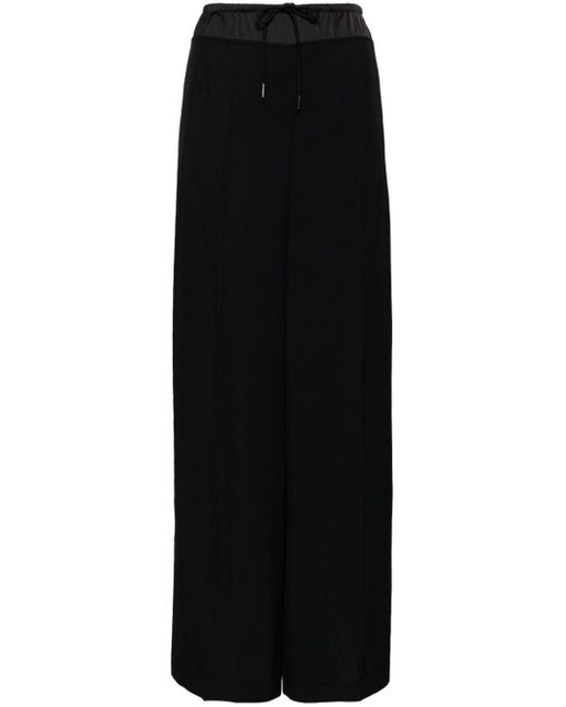 Pantalon ample à design superposé Juun.J en coloris Black