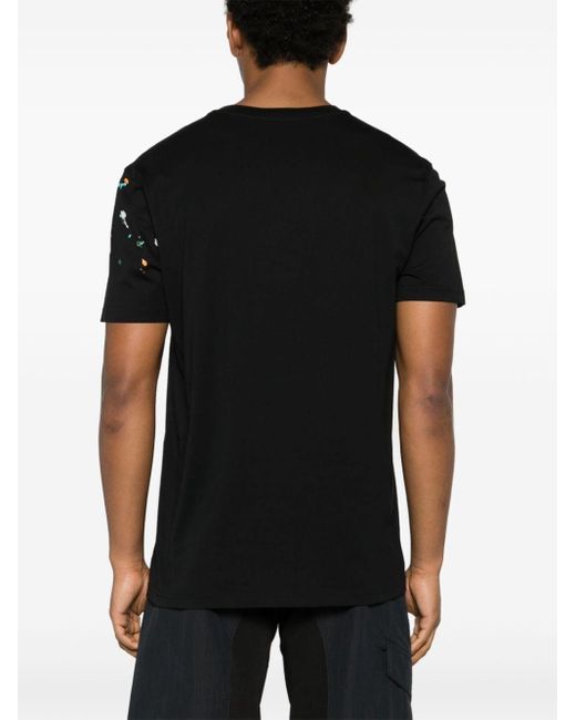 T-shirt à effet taches de peinture Moschino pour homme en coloris Black