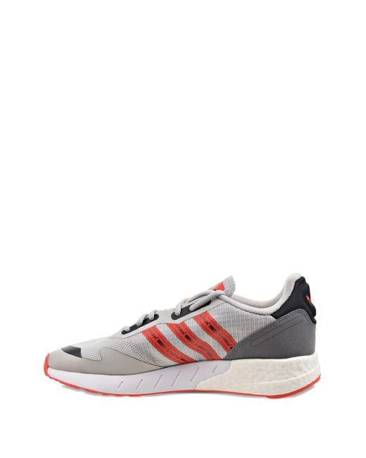 Sneakers Zx 1K Boost Semi/Solar" di Adidas in Pink da Uomo