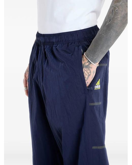 Adidas Blue Equipment Track Pants for men