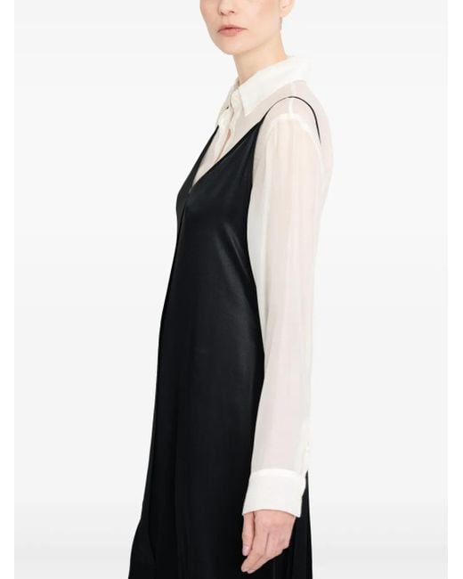 Vestido midi con diseño a capas UMA | Raquel Davidowicz de color Black