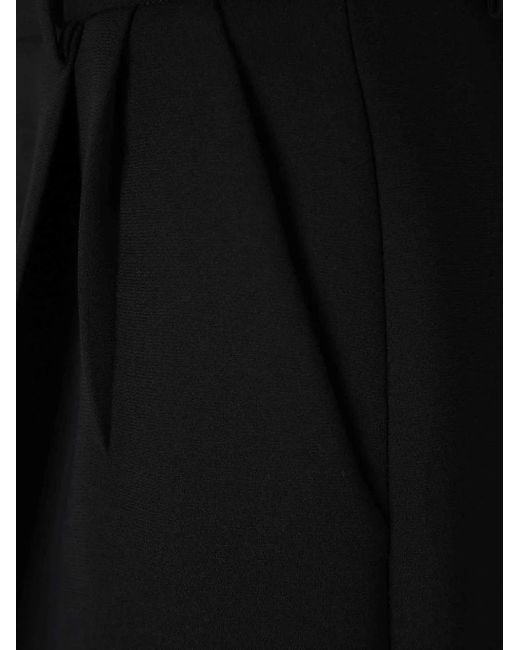Khaite Black High-Waist-Hose mit Bundfalten