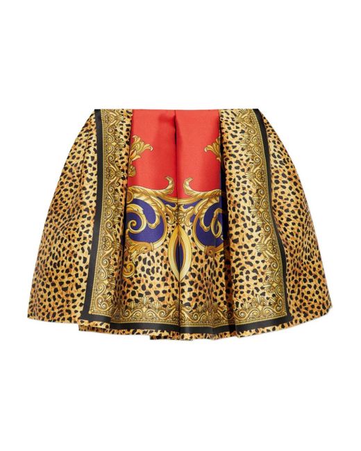 Minijupe À Design Plissé Versace en coloris Yellow