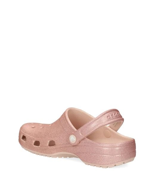 Sandalias tipo zuecos con purpurina CROCSTM de color Pink