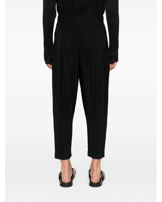 Homme Plissé Issey Miyake Black Plissé-Effect Tapered Trousers for men