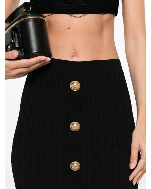 Falda midi de punto de ochos con botón Balmain de color Black