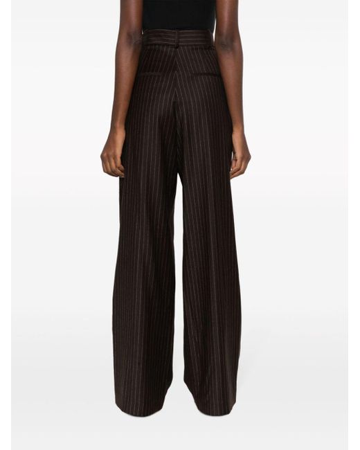 The Mannei Black Pinstripe Flared Wool Trousers