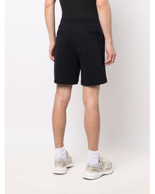 Pantalones cortos de deporte con logo bordado Emporio Armani de hombre de  color Azul | Lyst