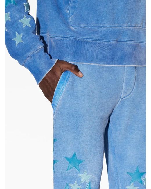 Amiri Blue Star-Patch Cotton Track Pants for men