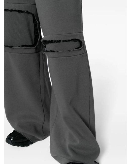 Pantaloni sportivi a gamba ampia con dettaglio cut-out di MM6 by Maison Martin Margiela in Gray da Uomo