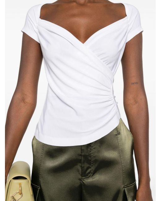 Camiseta asimétrica drapeada Norma Kamali de color White