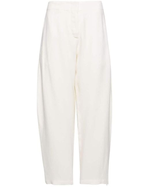 Pantaloni Awe con gamba curva di Studio Nicholson in White