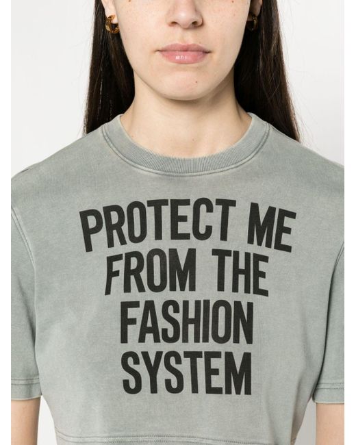 T-shirt crop à imprimé texte Moschino en coloris Gray
