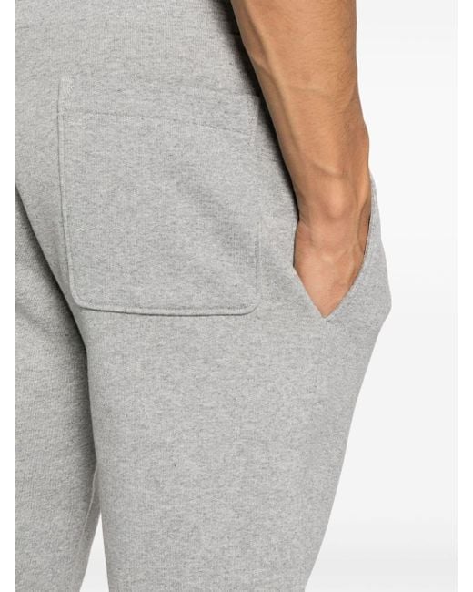Pantalon de jogging à patch logo Moncler pour homme en coloris Gray